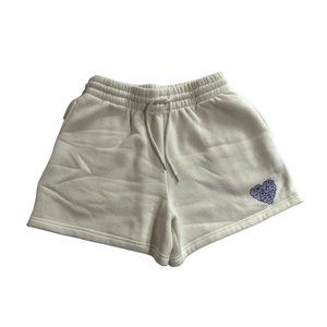 White Fox Boutique Cream Athletic Drawstring Shorts with Purple Heart Patch